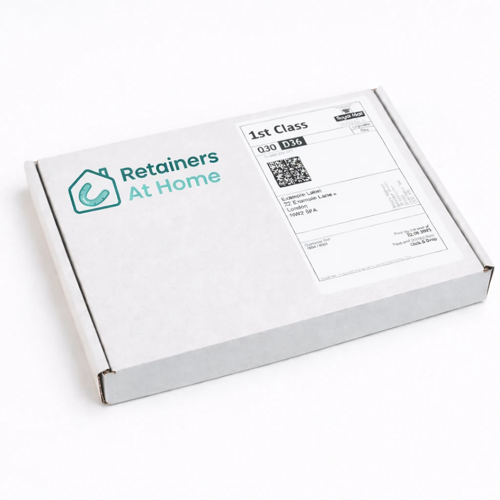 Retainers At Home dental impression kit box with Royal Mail 1st Class shipping label — angled view
